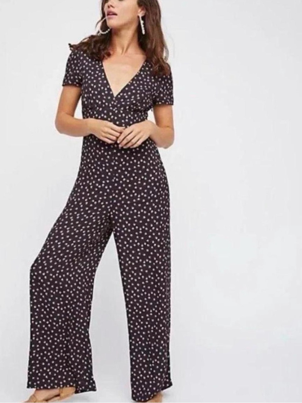 Free People Mia Jumpsuit featuring a pink rose print, short sleeves